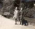 Reville / Walton family. Children walking a dog
