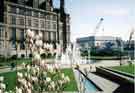 Fountains in the Peace Gardens showing (left) the Town Hall and (centre) the construction of the Winter Garden