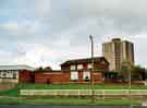 View from Dyche Lane showing (left) Jordanthorpe Library, (centre) the Jordanthorpe public house, and (back) tower block on Jordanthorpe / Batemoor housing estate