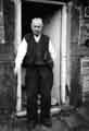 Man standing in doorway