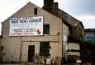 Nos.202-206 Penistone Road prior to demolition showing customer car park for Weir Head Garage