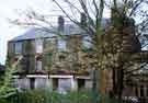Derelict shops, Market Street, Woodhouse showing (left to right) Winifred Camden (No.3), ladies outfitter; Audrey's Flower Centre and D. J. Tomlinson Ltd., chemists