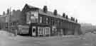 View: t10339 Terrace housing on (right) Upwell Street at the junction with Carlisle Street East showing (centre) No.127 Tony's, barbers