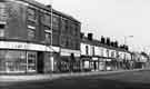 Derelict shops on Attercliffe Road showing (centre) Nos. 817-819 South Discount Store, drapers