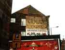 Advertising hoardings on the gable end of the Riverside Court Hotel, Nos. 4 - 12 Nursery Street at the junction with The Wicker
