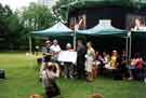 View: t10507 Cheque presentation to the Weston Park project from the Friends of Crookes Valley and Weston Parks (for £4,300) at Broomhill Festival, Weston Park