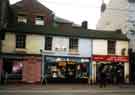 Shops on West Street showing (centre) No.145 High class shoe repairs (latterly Cobblers and Keys) and No. 147 West Street Pet Supplies
