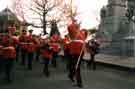 View: t10784 Military band marching past the York and Lancaster War Memorial in Weston Park on Remembrance Day