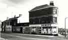 Shops on Ellesmere Road at junction with (right) Gower Street showing (l. to r.) Nos. 42-44 Evans DIY and Paint Shop, No.40 Wells, grocers and confectioner and No. 36, W. Jamieson (Chemists) Ltd.