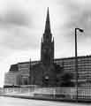 St. John the Evangelist C. of E. Church, Bernard Street, Park showing Hyde Park Flats behind