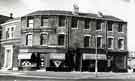 Doorway of Burngreave Library (left) and R. Mattock and Sons, butchers, No. 5 Ellesmere Road at Junction with (left) Gower Street