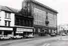 West Bar showing (l. to r.) No.130 Key Finance, financial brokers, No. 126 International Aquatics Centre, tropical fish suppliers and former 'The Hostel', also known as Tudor House, occupied by P. W. Lacey Ltd., No 120, West Bar