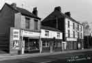 Shops on Attercliffe Road showing (l. to r.) No. 707 Abid Bros., luggage suppliers, No. 709 Kings Head public house and No. 711 Stamps and Cowley, possible discount shop