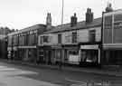 Shops on Attercliffe Road showing (l. to r.) No. 738 Curry's Ltd., radio and television dealers, Nos.734-736 Attercliffe Branch Post Office, No.732 Station Hotel, No.730 Hargeisa cafe, No. 728 H. Hewitt, hairdressers and No. 726 G. Myers, butcher