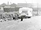 Traveller children and caravan on unspecified street, Attercliffe