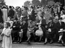 World War Two, Holidays at Home - They couldn't get into the concert party - it was chock full. So they sit outside the ring and see what they can