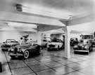 E. H. Pickford and Co. Ltd., motor dealer and engineer. Display of Hillman, Humber and Sunbeam Talbot cars in the showroom, c. 1953