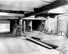E. H. Pickford and Co. Ltd., motor dealer and engineers, Crescent Works, Ecclesall Road, showing the interior of the showroom during building operations.