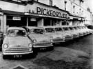 E. H. Pickford and Co. Ltd., motor dealer and engineers, Crescent Works, Ecclesall Road. Line up of 10 William Huskey vans on forecourt (reg. nos. 2781 W - 2790 W), 1960
