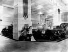 Farmer Federal Motors Ltd., a subsidiary of E. H. Pickford and Co. Ltd of Ecclesall Road. Farmer Federal Motors Ltd stand at an automobile exhibition with several Federal chassis on display. 1938.