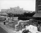 View: u07710 Timber yard at the Sheffield Canal Basin, off Park Square showing Park Hill and Hyde Park flats behind