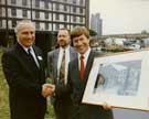 View: u07715 Michael Portillo MP (possibly as Minister of State for Transport) (right) receiving a print of the Sheffield Canal Basin, off Park Square 