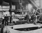 Bending armour plate at the world's first forge press installed at the Cyclops Iron and Steel Works, Charles Cammell and Co. Ltd. junction of Savile Street and Sutherland Street  