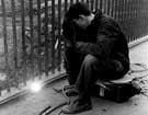 Welder at work on footbridge over the Jervis Lum Woodland, Norfolk Park,