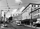 View: u08136 Tram No.527 on High Street showing Nos. 59 - 65 C and A, Modes Ltd; No. 73, W. Barratt and Co. Ltd., boot and shoe dealers, No. 75 G. A. Dunn and Co. Ltd., hatters, 