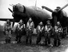 Unidentified group of airman in front of an RAF Wellington bomber aircraft