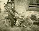 Unidentified man on a motor bike.