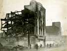 Damage to J. Graham Ltd., house furnishers, Nos.166-168 The Moor, after an air raid