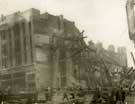Montague Burton Ltd., tailors, No. 51-55, High Street and junction with Market Place, showing air raid damage 