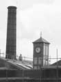 Chimney and clock tower at Cooper Brothers and Sons Ltd., manufacturers of silver, electro-plate and stainless cutlery, Don Plate Works, No. 44 Arundel Street