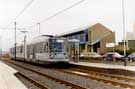 Supertram during trials at Attercliffe stop, junction of Shirland Lane and Shortridge Street showing Stadia Technology Park (formerly Sheffield Technology Park) behind