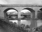 View looking through Norfolk Midland Railway Viaduct towards Walter Spencer and Co. Ltd, Crescent Steel Works, Warren Street