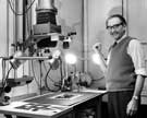 View: u08594 Harold Booth, libraries photographer, making copy negatives from old photographic prints, Central Library, Surrey Street