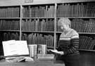 View: u08608 Member of staff in the Local Studies library, Central Library, Surrey Street