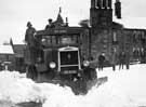 Snowplough and gritting lorry