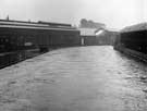 Flooding caused by torrential rain outside English Steel Corporation's River Don Works, Brightside Lane.