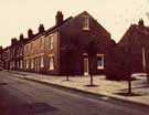 Row of terraced houses, the street sign reads 'Pexton' so probably Pexton Road