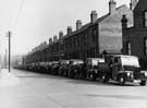 Line of Sheffield City Corporation Engineers and Surveyors Office vehicles on an unidentified street, 12 october 1956.