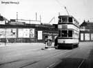 Tram travelling along Nursery Street, alongside Bridgehouses Goods Station