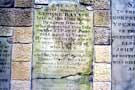 Headstone of George Raynor, Waterloo veteran, set into a wall at Hillsborough Barracks