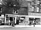 Shops on Ecclesall Road showing No. 659 The Doll's House, antiques shop, No. 661 cigar and tobacco shop and Nos. 663 - 665 E. H. Armytage, outfitters