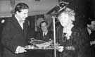 Presentation to Sir John Barbirolli on his 50th birthday of pieces of Old Sheffield Silver Plate, from the members of the Listeners Club. Presented at the Victoria Hall on 2nd December 1949