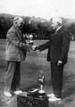 View: u09649 Bowls competition trophy being awarded, probably at Hillsborough Park and in connection with Hillsborough Park Bowling Club.