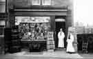 Grocer and general supplies shop belonging to J. G. Riley, No. 77 Queen Street, Mosborough, decorated for the coronation of George V, 1911