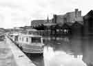 Boats at the Canal Basin looking towards Hyde Park Flats and Park Hill Flats, with the spire of St John's Church, Park visible too. Boats at the Canal Basin looking towards Hyde Park Flats and Park Hill Flats, with the spire of St John's Church, Park visible too.