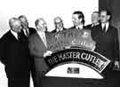 Group at Firth Vickers Stainless Steels Ltd with the name plate for the Master Cutler locomotive Group at Firth Vickers Stainless Steels Ltd with the name plate for the Master Cutler locomotive